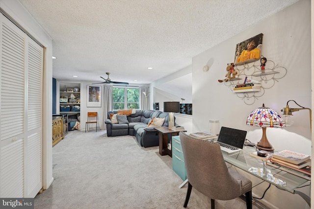 3508 Waltham Ct, Yardley, PA 19067 - living room featuring a textured ceiling, carpet, a ceiling fan, a desk, and recessed lighting