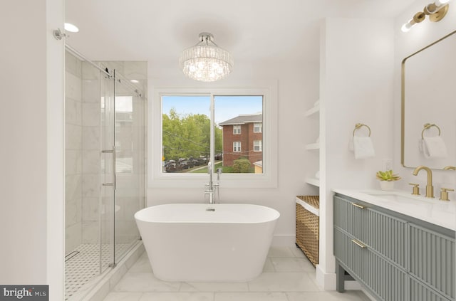 4327 2nd St NW, Washington, DC 20011 - full bath with a shower stall, a freestanding tub, vanity, and a chandelier