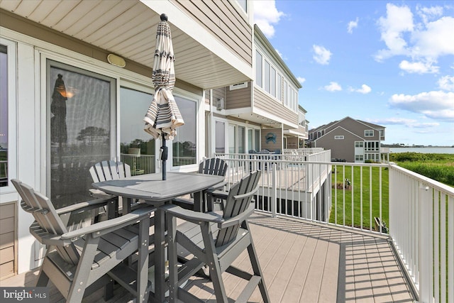 38336 Ocean Vista Dr Unit 1098, Selbyville, DE 19975 - deck featuring outdoor dining area and a yard