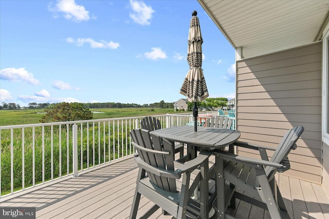 38336 Ocean Vista Dr Unit 1098, Selbyville, DE 19975 - wooden terrace with outdoor dining space