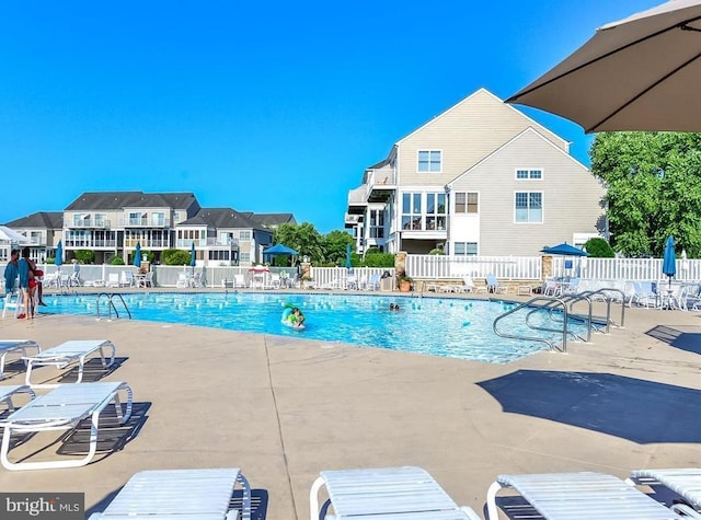 38336 Ocean Vista Dr Unit 1098, Selbyville, DE 19975 - community pool featuring a patio area and a residential view