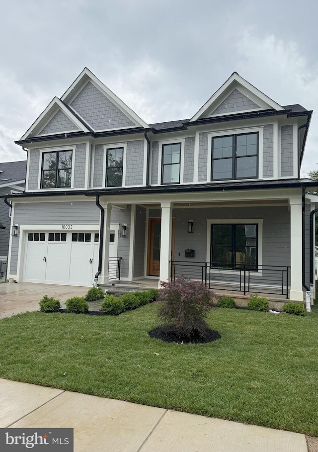 10033 Clue Dr, Bethesda, MD 20817 - view of front of home featuring a porch, an attached garage, and a front yard