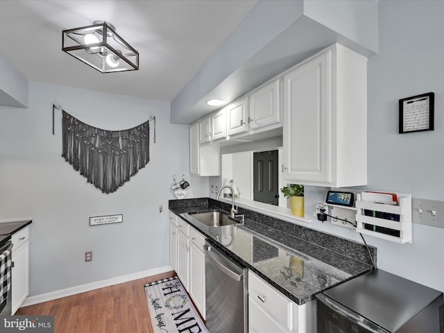 2 Marsha Dr, Cressona, PA 17929 - kitchen featuring dishwasher, white cabinets, wood finished floors, and dark stone counters