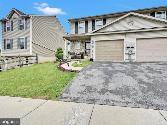 2 Marsha Dr, Cressona, PA 17929 - view of front of house with driveway, an attached garage, a porch, and stone siding