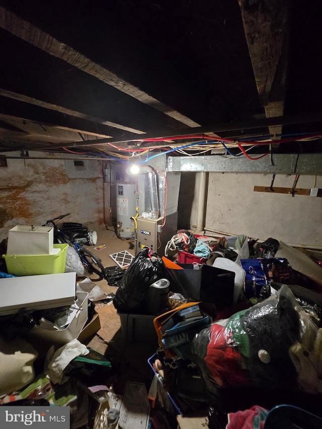 2513 W Sergeant St, Philadelphia, PA 19132 - unfinished below grade area with water heater and heating unit
