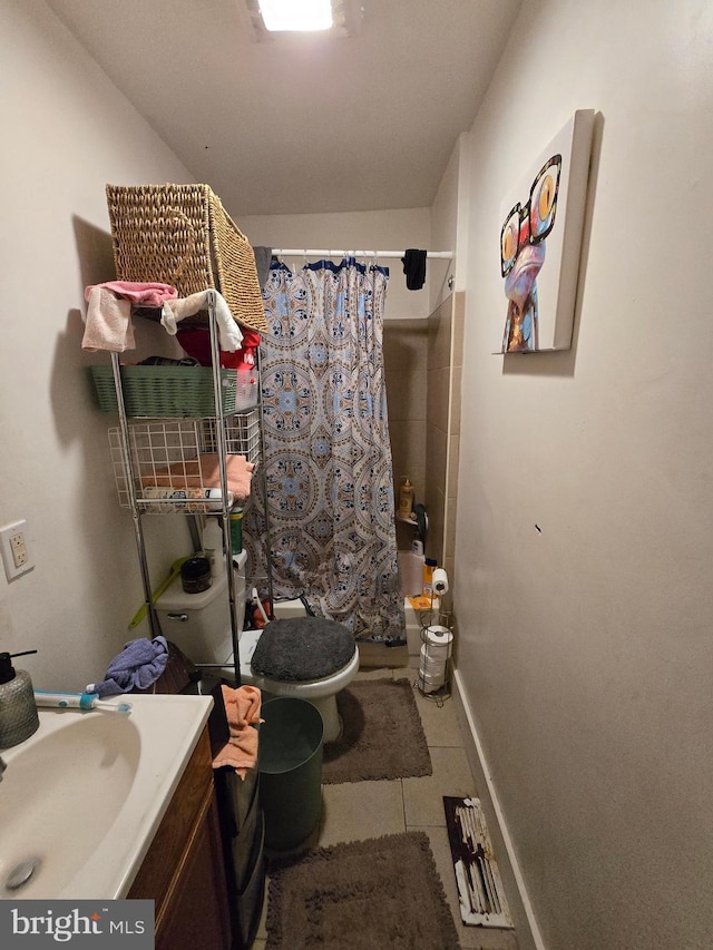2513 W Sergeant St, Philadelphia, PA 19132 - full bathroom with tile patterned floors, vanity, and shower / tub combo