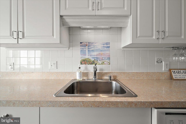 11603 Seaward Rd Unit 6, Ocean City, MD 21842 - kitchen with white cabinets, custom exhaust hood, decorative backsplash, and light countertops