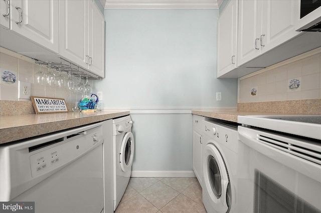 11603 Seaward Rd Unit 6, Ocean City, MD 21842 - washroom featuring light tile patterned floors, independent washer and dryer, and crown molding