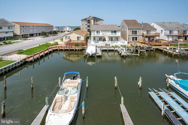 11603 Seaward Rd Unit 6, Ocean City, MD 21842 - dock featuring a residential view, boat lift, and a water view