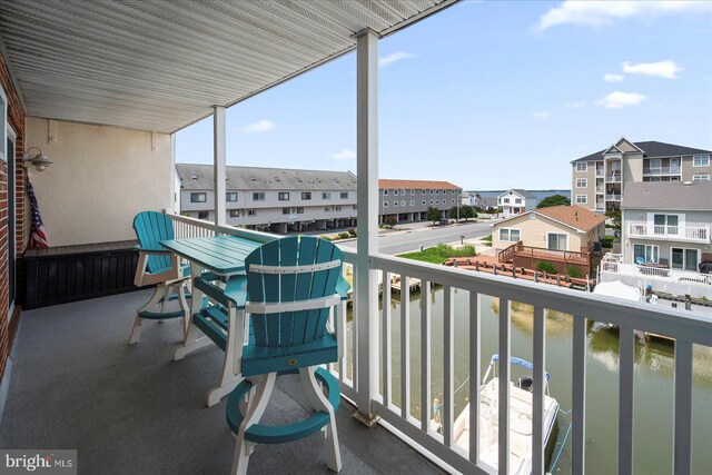 11603 Seaward Rd Unit 6, Ocean City, MD 21842 - balcony featuring a water view and a residential view