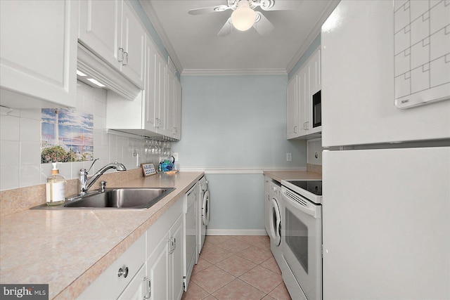 11603 Seaward Rd Unit 6, Ocean City, MD 21842 - kitchen featuring white appliances, washer and clothes dryer, ceiling fan, white cabinets, and tasteful backsplash
