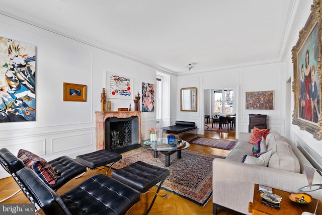 237 S 18th St Unit 20A, Philadelphia, PA 19103 - living room featuring a decorative wall, ornamental molding, and a high end fireplace