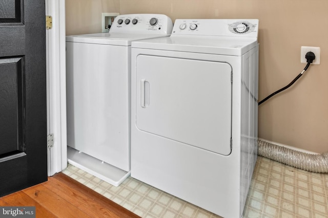 42806 Longworth Ter, Chantilly, VA 20152 - washroom featuring light floors and washer and clothes dryer