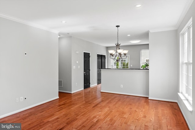 42806 Longworth Ter, Chantilly, VA 20152 - unfurnished room with a chandelier, crown molding, light wood-style flooring, and recessed lighting