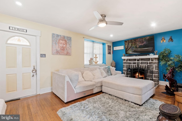 114 Kenmore Rd, Upper Darby, PA 19082 - living room with a stone fireplace, ceiling fan, wood finished floors, baseboards, and recessed lighting