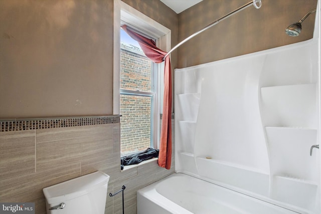 3737 N 18th St, Philadelphia, PA 19140 - bathroom with tile walls, bathing tub / shower combination, and toilet