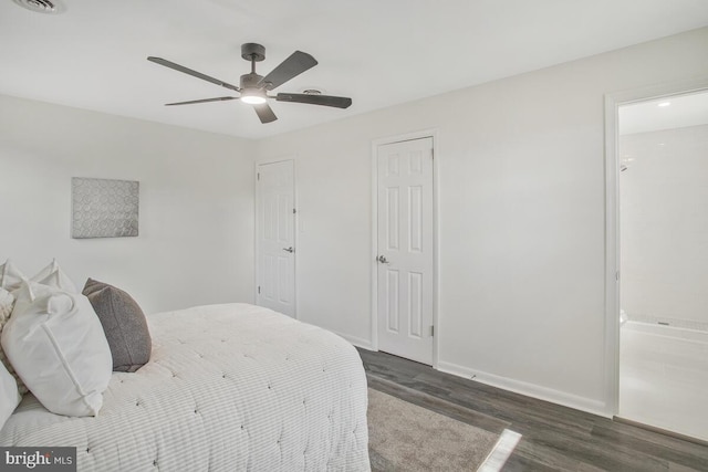 5917 Linthicum Ln, Linthicum Heights, MD 21090 - bedroom featuring dark wood-type flooring, ensuite bathroom, a ceiling fan, and a closet