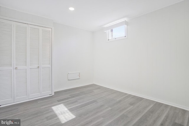 5917 Linthicum Ln, Linthicum Heights, MD 21090 - unfurnished bedroom with wood finished floors, a closet, and recessed lighting