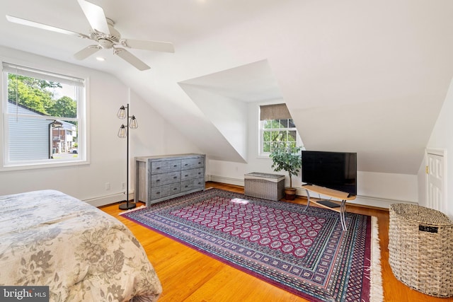 1540 Davidson Rd, Abington, PA 19001 - bedroom with vaulted ceiling, wood finished floors, a baseboard heating unit, and a ceiling fan