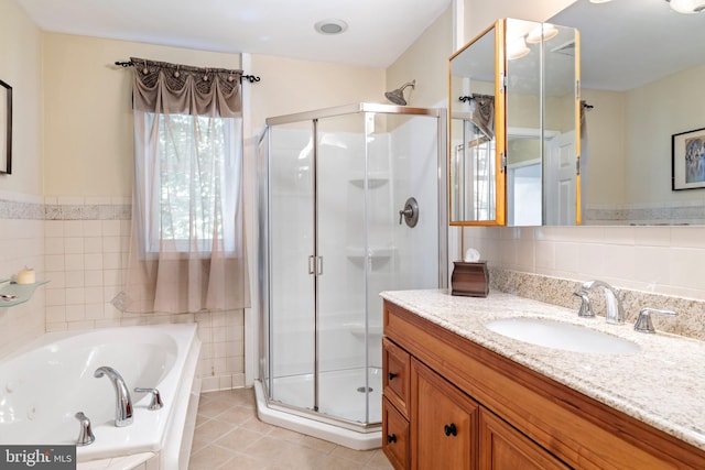 1540 Davidson Rd, Abington, PA 19001 - bathroom featuring vanity, a stall shower, tile walls, a tub with jets, and tile patterned flooring