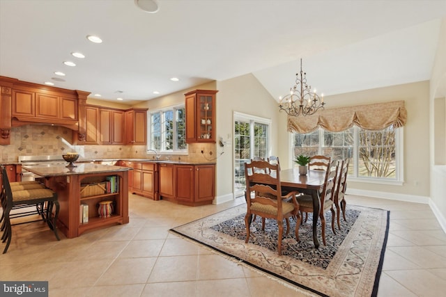 2573 Muirfield Way, Lansdale, PA 19446 - dining space featuring a chandelier, light tile patterned flooring, recessed lighting, and lofted ceiling