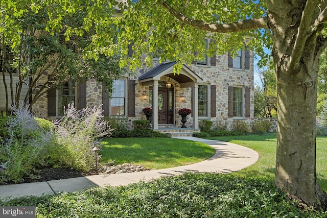 2573 Muirfield Way, Lansdale, PA 19446 - view of front of home with stone siding and a front yard