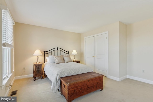 2573 Muirfield Way, Lansdale, PA 19446 - bedroom with light colored carpet, multiple windows, and a closet