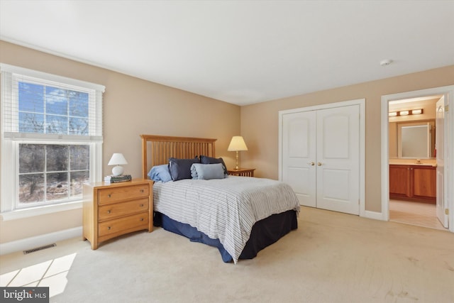 2573 Muirfield Way, Lansdale, PA 19446 - bedroom featuring light colored carpet, a closet, and connected bathroom