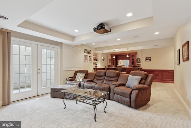 2573 Muirfield Way, Lansdale, PA 19446 - living room featuring french doors, light colored carpet, and recessed lighting