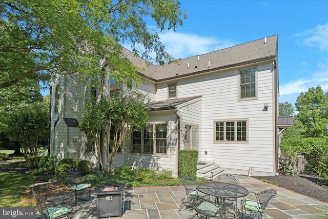 2573 Muirfield Way, Lansdale, PA 19446 - back of property with a patio area and a fire pit