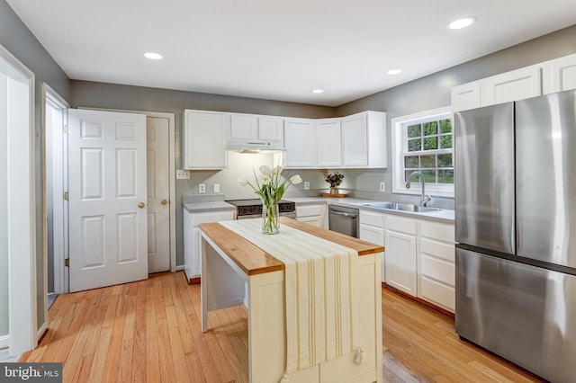244 Marsden Heights Rd, Linden, VA 22642 - kitchen featuring stainless steel appliances, a sink, wooden counters, light wood-style floors, and recessed lighting