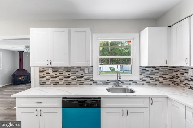 15 Excell Ln, Willingboro, NJ 08046 - kitchen featuring dishwashing machine, white cabinetry, wood finished floors, and tasteful backsplash