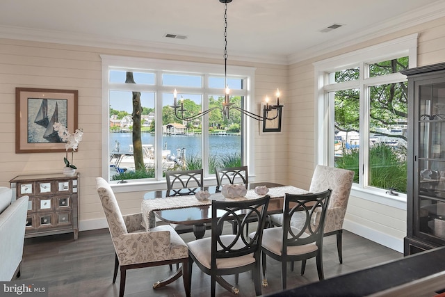 16 Spa Creek Lndg, Annapolis, MD 21403 - dining room featuring crown molding, plenty of natural light, a water view, dark wood-style flooring, and wood walls