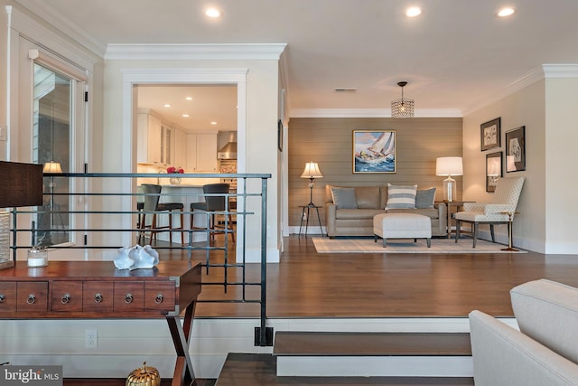 16 Spa Creek Lndg, Annapolis, MD 21403 - living room featuring wood finished floors, ornamental molding, and recessed lighting