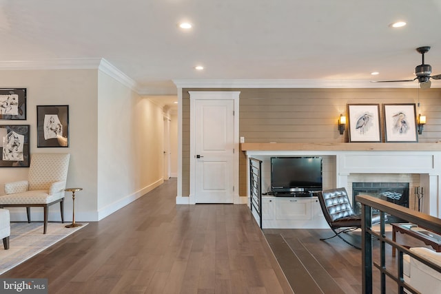 16 Spa Creek Lndg, Annapolis, MD 21403 - living room featuring crown molding, ceiling fan, dark wood-type flooring, a fireplace, and recessed lighting