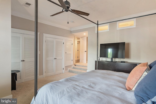 16 Spa Creek Lndg, Annapolis, MD 21403 - carpeted bedroom featuring crown molding, multiple closets, and ceiling fan