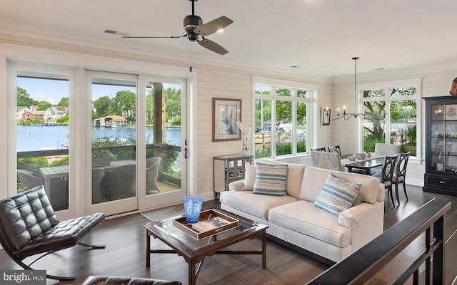 16 Spa Creek Lndg, Annapolis, MD 21403 - living area featuring a chandelier, ornamental molding, healthy amount of natural light, a water view, and wood finished floors