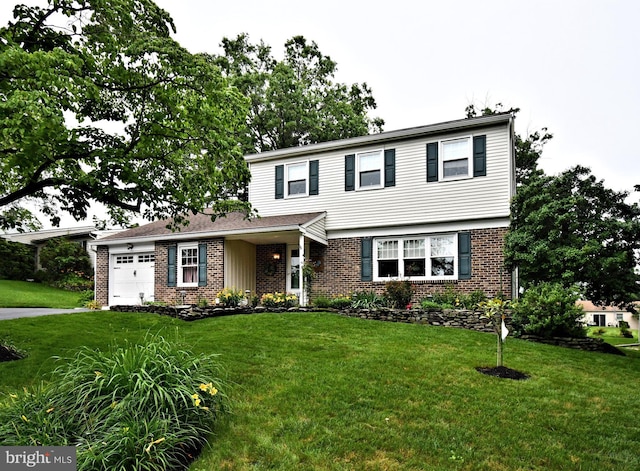 403 Grenoble Dr, Sellersville, PA 18960 - view of front of property with brick siding, a garage, and a front yard