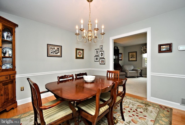 403 Grenoble Dr, Sellersville, PA 18960 - dining area featuring a chandelier and light wood-type flooring