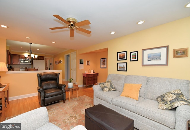 403 Grenoble Dr, Sellersville, PA 18960 - living room featuring a chandelier, light wood-style floors, a ceiling fan, and recessed lighting