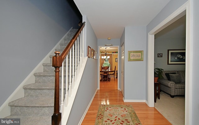 403 Grenoble Dr, Sellersville, PA 18960 - staircase with wood finished floors and a chandelier