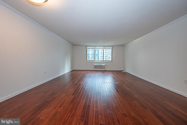 1919 Chestnut St Unit 1722, Philadelphia, PA 19103 - empty room with crown molding, an AC wall unit, and dark wood-style flooring