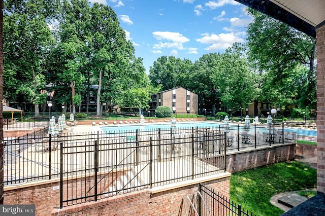 9720 Kingsbridge Dr Unit 302, Fairfax, VA 22031 - community pool featuring view of scattered trees