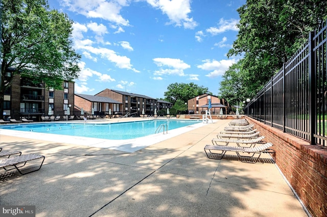 9720 Kingsbridge Dr Unit 302, Fairfax, VA 22031 - community pool featuring a patio area