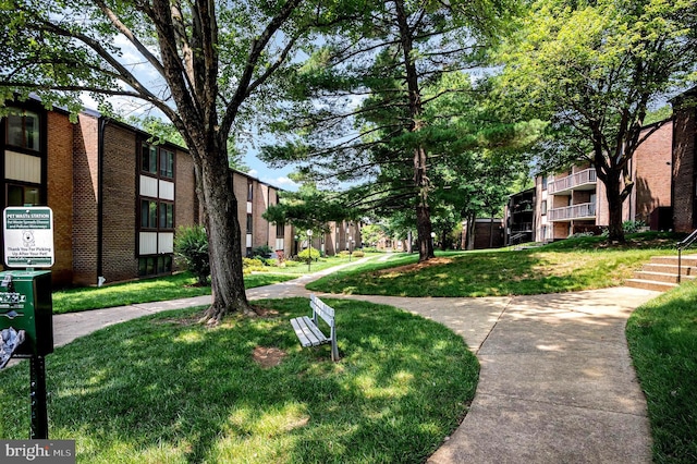 9720 Kingsbridge Dr Unit 302, Fairfax, VA 22031 - view of community featuring a yard