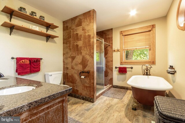 3150 Rushland Rd, Jamison, PA 18929 - full bath featuring a shower stall, a freestanding bath, wood finished floors, vanity, and toilet