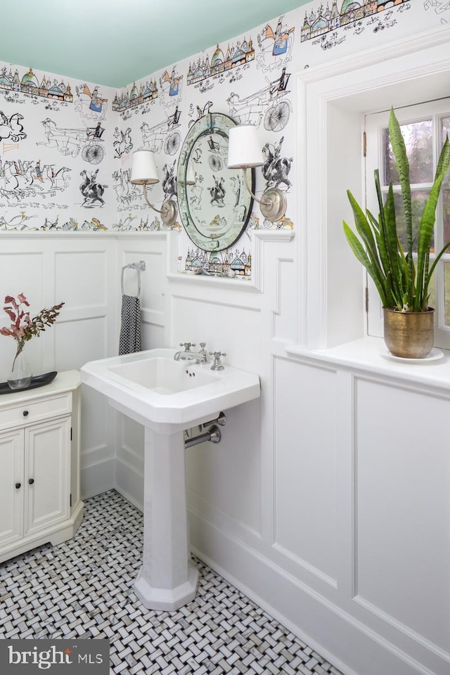 673 Ardmore Ave, Ardmore, PA 19003 - bathroom with a decorative wall and a wainscoted wall
