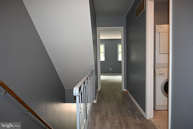 85 Park Vallei Ln Unit 85, Brookhaven, PA 19015 - corridor with stacked washer / dryer, an upstairs landing, and wood finished floors