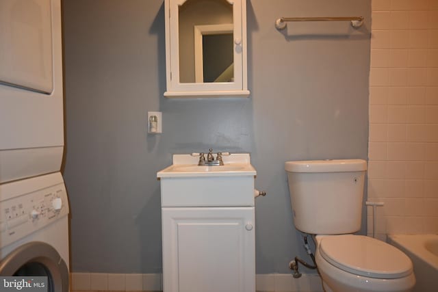 85 Park Vallei Ln Unit 85, Brookhaven, PA 19015 - bathroom featuring vanity, stacked washer and clothes dryer, and shower / bath combination