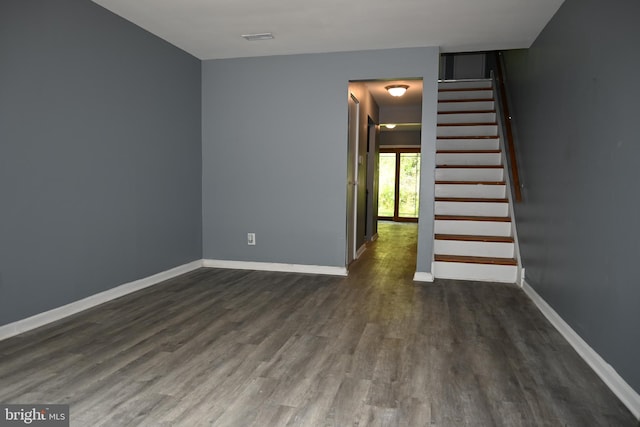 85 Park Vallei Ln Unit 85, Brookhaven, PA 19015 - spare room featuring dark wood-style floors and stairs